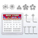 box w 52 silver nose studs w flower crystal tops in clear